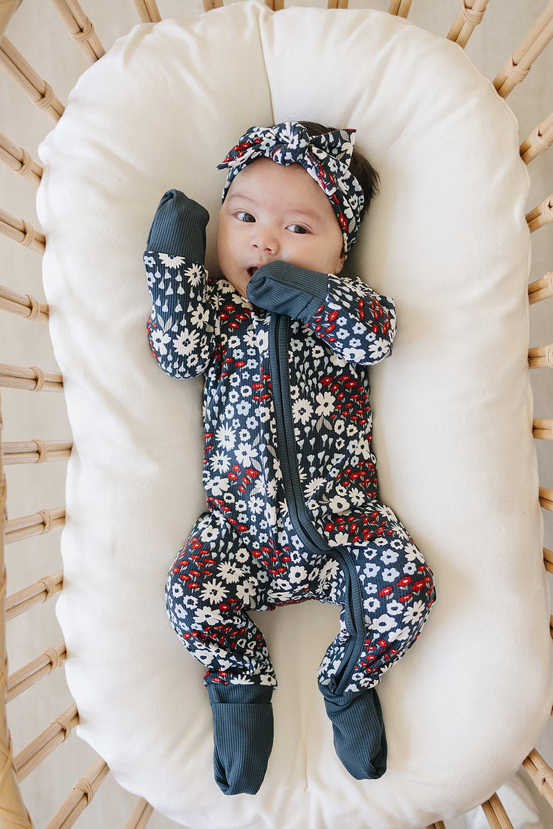 Made for all-day comfort, the Mebie Baby Americana Floral Ribbed Bamboo Zipper offers a sweet take on cute onesies
