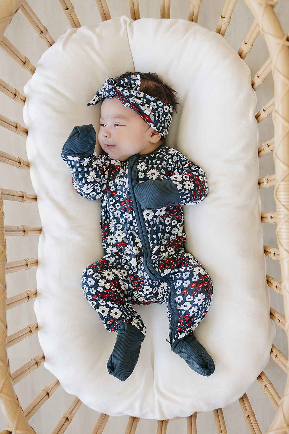 Designed for easy changes, the Mebie Baby Americana Floral Ribbed Bamboo Zipper works beautifully as comfy onesie pajamas