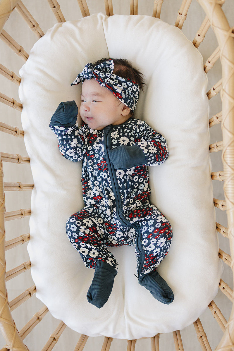Designed for easy changes, the Mebie Baby Americana Floral Ribbed Bamboo Zipper works beautifully as comfy onesie pajamas