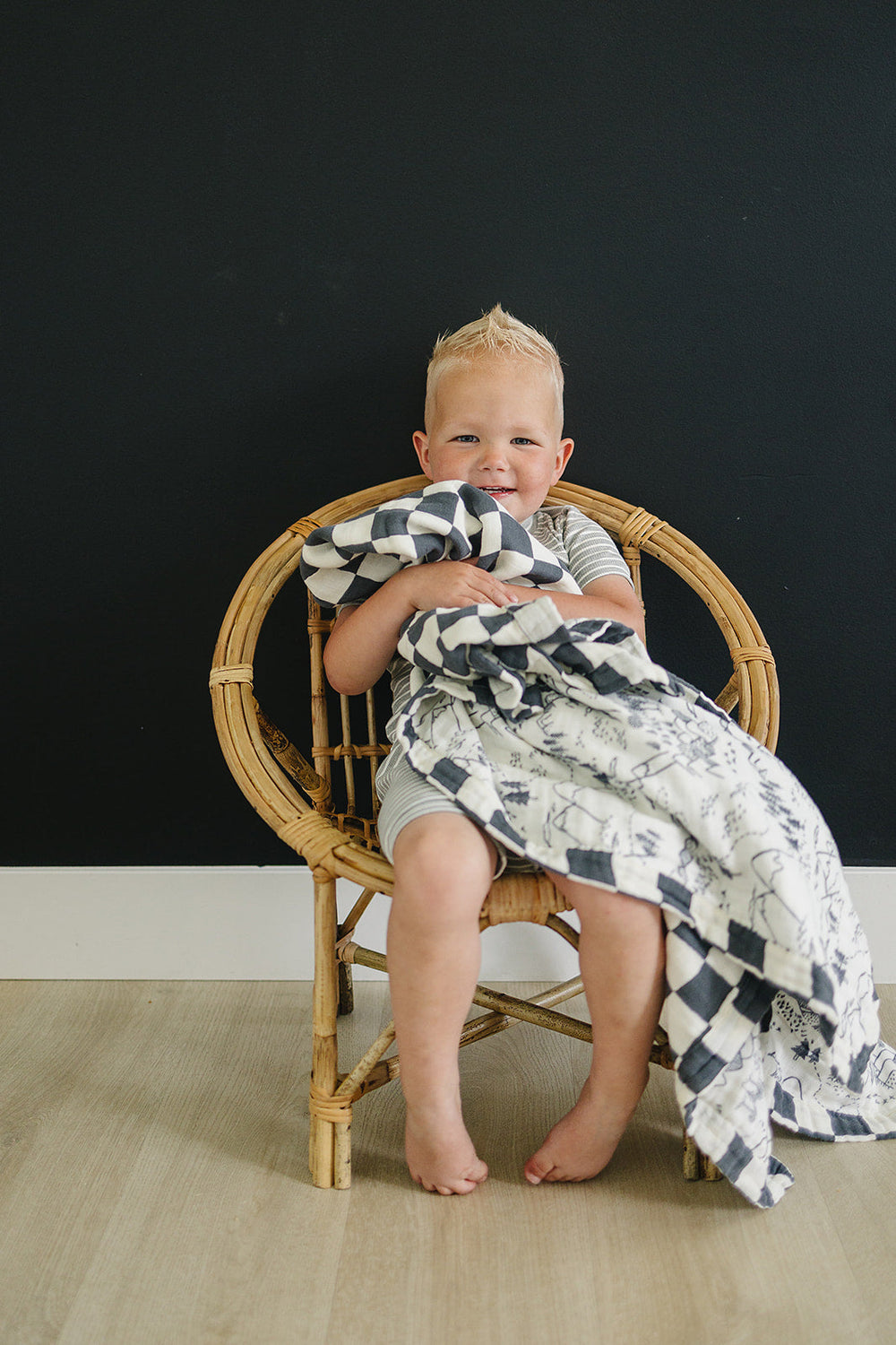 Mebie BabyÕs Charcoal Checkered + Summit Muslin Quilt offers breathable comfort as a gentle muslin.