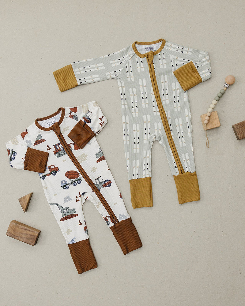 Designed with long sleeves and smooth zipper, the Mebie Baby Ski Ribbed Bamboo Zipper stands out as cute onesies