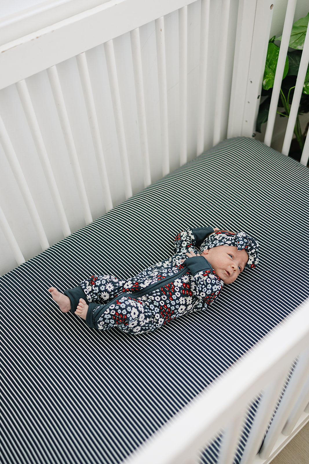 Breathable ribbed bamboo makes the Mebie Baby Americana Floral Zipper a gentle choice among everyday baby onesies