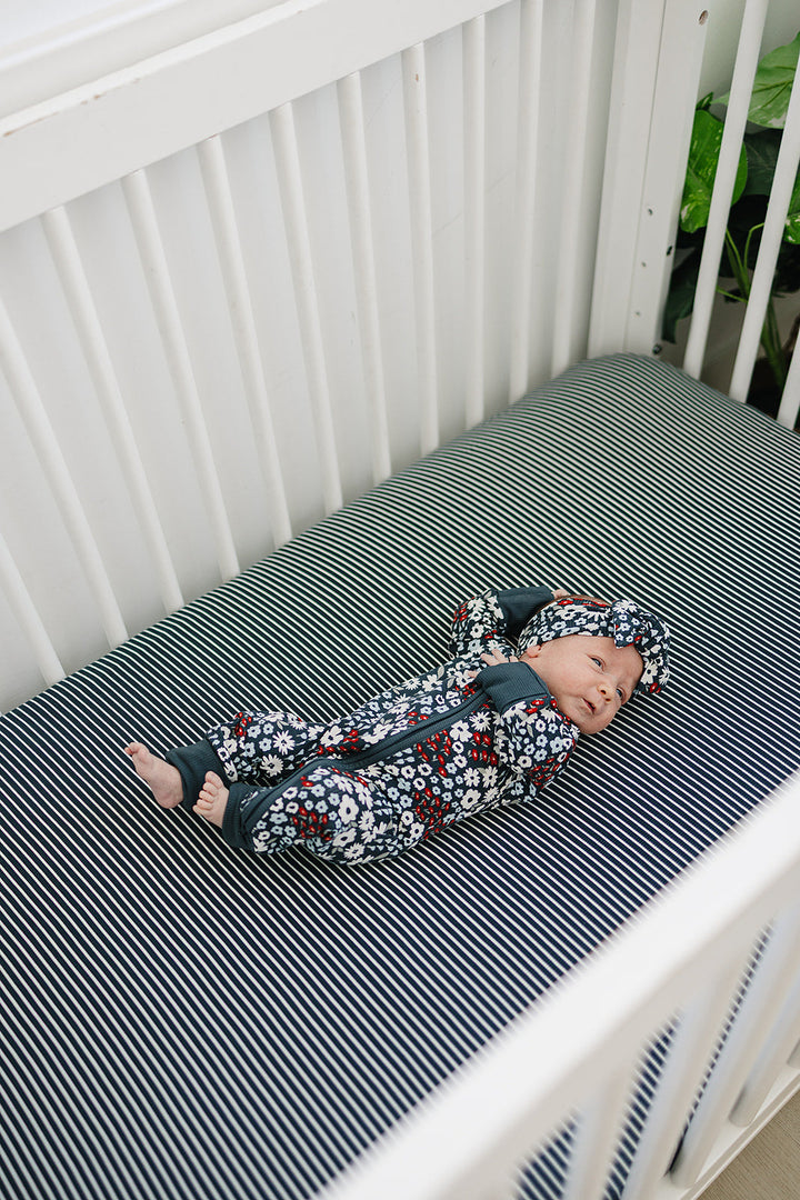 Breathable ribbed bamboo makes the Mebie Baby Americana Floral Zipper a gentle choice among everyday baby onesies