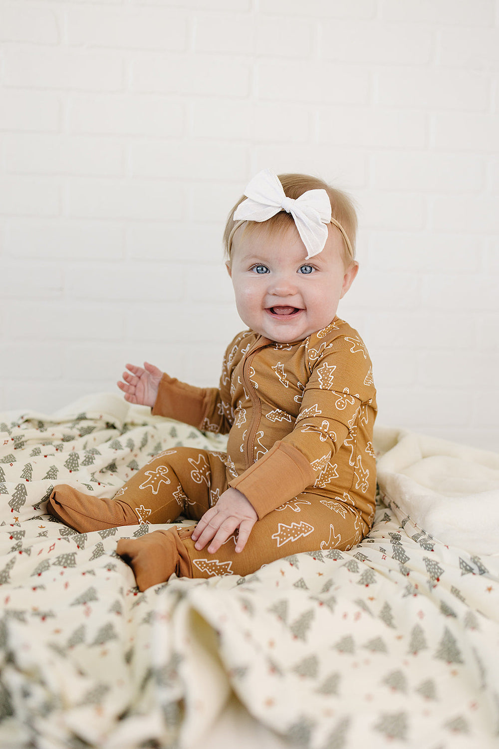 Soft and cozy, the Mebie Baby Gingerbread Bamboo Zipper makes a perfect baby onesie for everyday wear