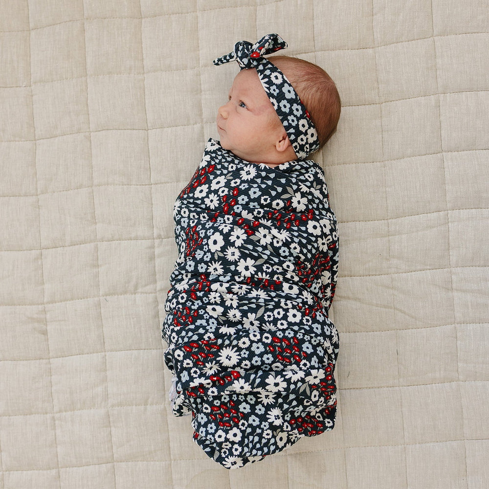 Wrap your little one in the Mebie Baby Americana Floral Ribbed Bamboo Stretch Swaddle, ideal baby swaddle blankets.