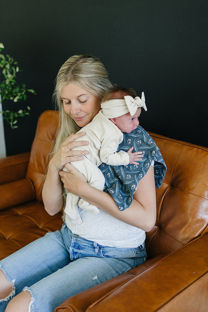 For effortless feeding, the Navy Berry Muslin Burp Cloth by Mebie Baby serves as practical muslin burp cloths.