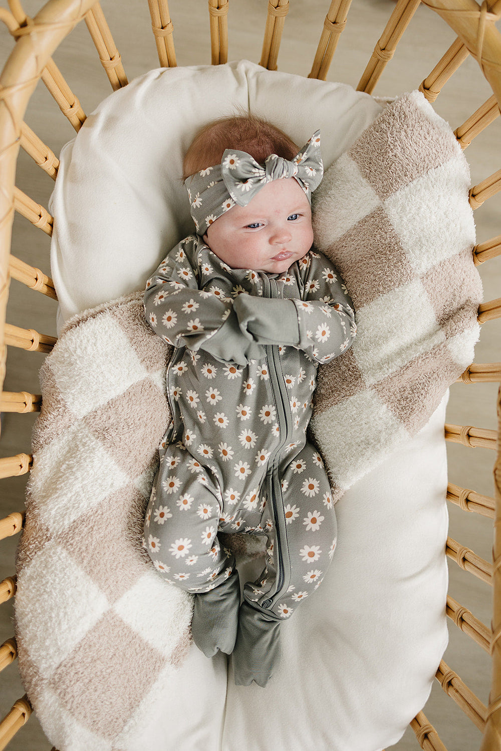 Mebie Baby Light Green Daisy Bamboo Zipper pictured alongside coordinating baby accessories