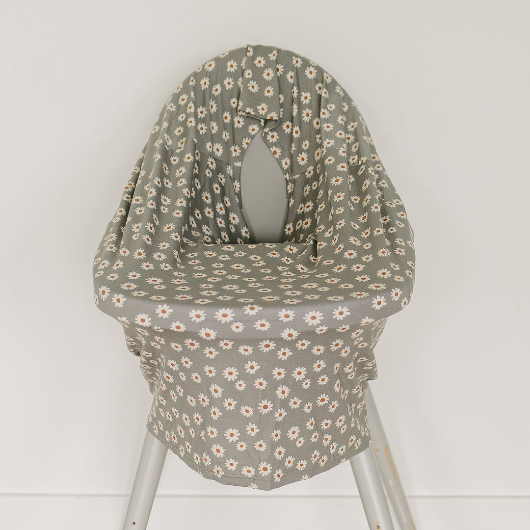 For cozy moments on the go, the Light Green Daisy Bamboo Multi-Use Cover from Mebie Baby works beautifully as a baby swaddle.