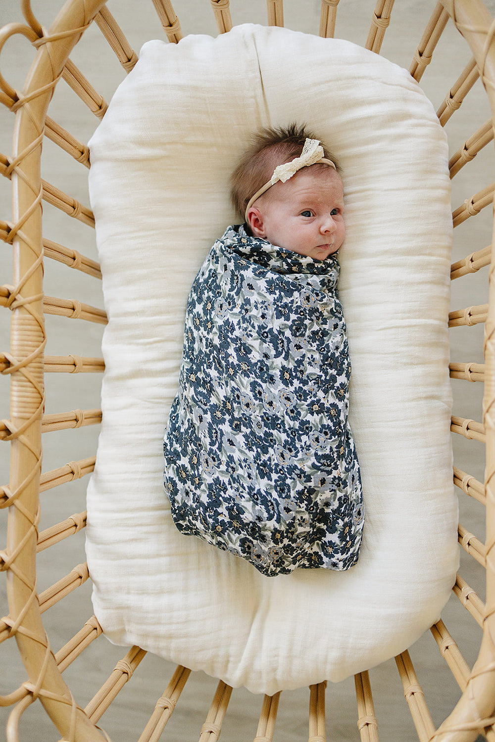 Wrap your newborn in the Mebie Baby Liberty Floral Muslin Swaddle Blanket, ideal as muslin swaddle blankets.