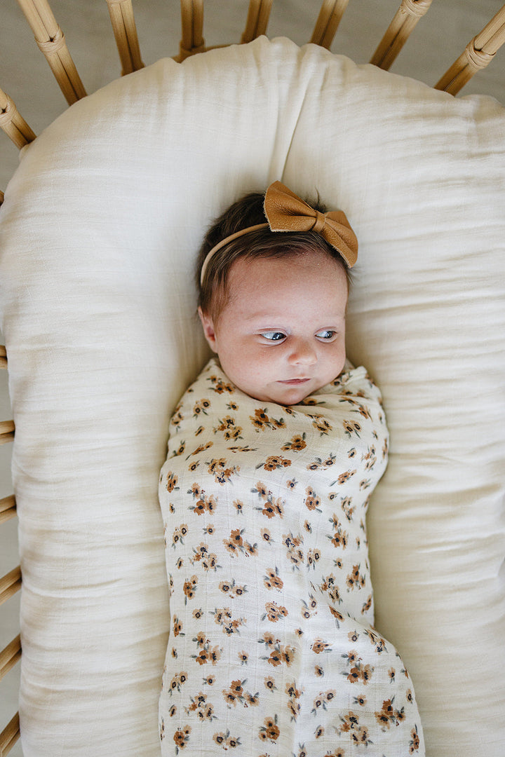 Snuggle-ready Autumn Bloom Muslin Swaddle Blanket by Mebie Baby, perfect as muslin fabric swaddle blankets.