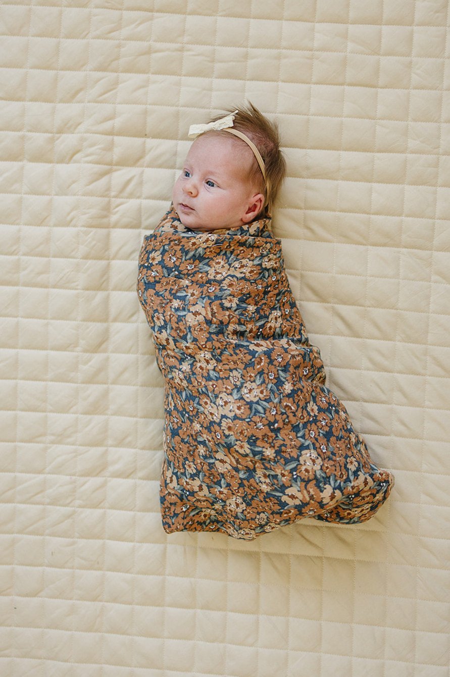 Wrap your newborn in the Mebie Baby Venetian Floral Muslin Swaddle Blanket, perfect as muslin swaddle blankets.