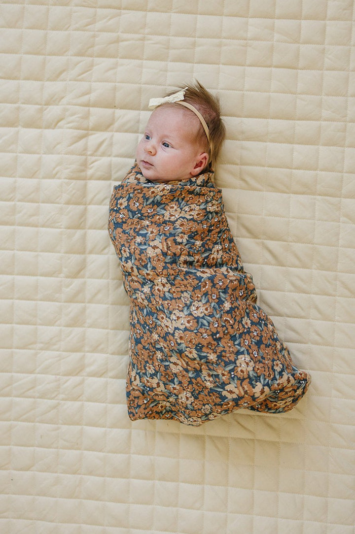 Wrap your newborn in the Mebie Baby Venetian Floral Muslin Swaddle Blanket, perfect as muslin swaddle blankets.