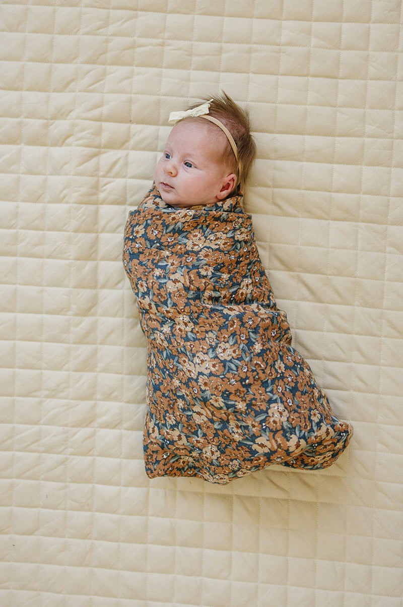 Wrap your newborn in the Mebie Baby Venetian Floral Muslin Swaddle Blanket, perfect as muslin swaddle blankets.