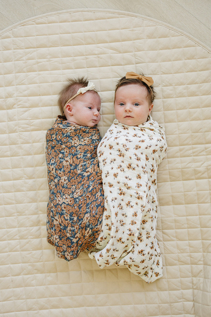 Mebie Baby Venetian Floral Muslin Swaddle Blanket provides gentle comfort as a muslin swaddle.