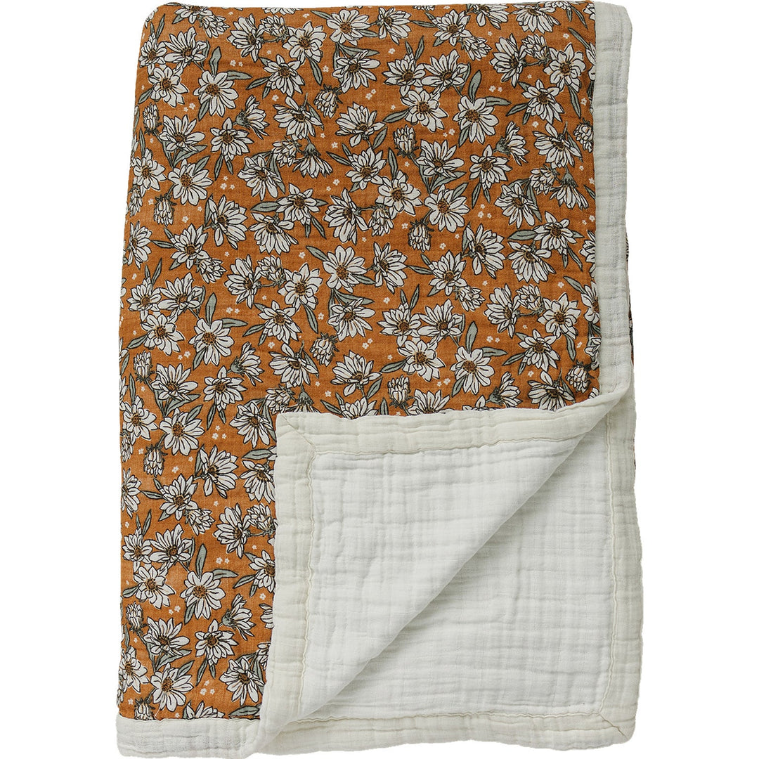 Snuggle your little one with the Mebie Baby Magnolia Floral Twin Muslin Quilt, a soft baby blanket.
