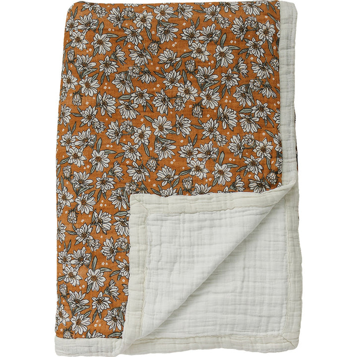 Snuggle your little one with the Mebie Baby Magnolia Floral Twin Muslin Quilt, a soft baby blanket.