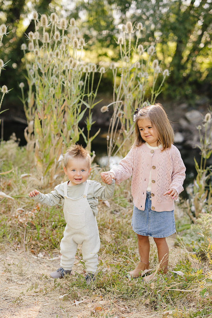 With timeless texture and charm, the Mebie Baby Grey Knit Overalls shine among cute baby clothes favorites
