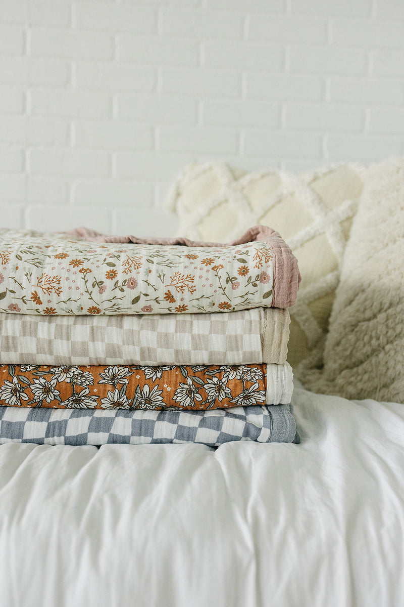 Lightweight and airy, the Mebie Baby Magnolia Floral Twin Muslin Quilt is great for muslin blankets baby.