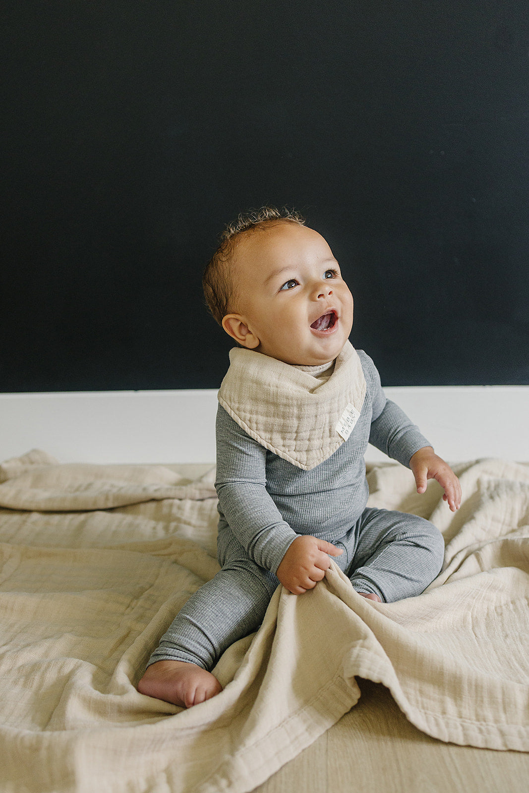 Mebie Baby Oatmeal Muslin Quilt provides gentle comfort as a breathable muslin.