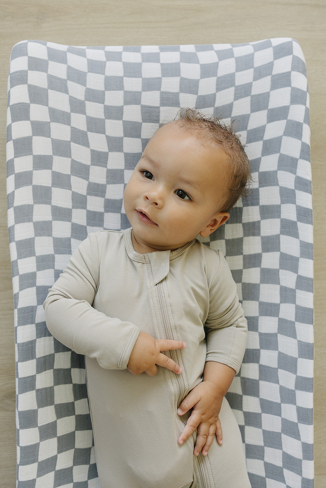 Mebie Baby Oatmeal Bamboo Footed Zipper shown up close to highlight the snap or zip detail.