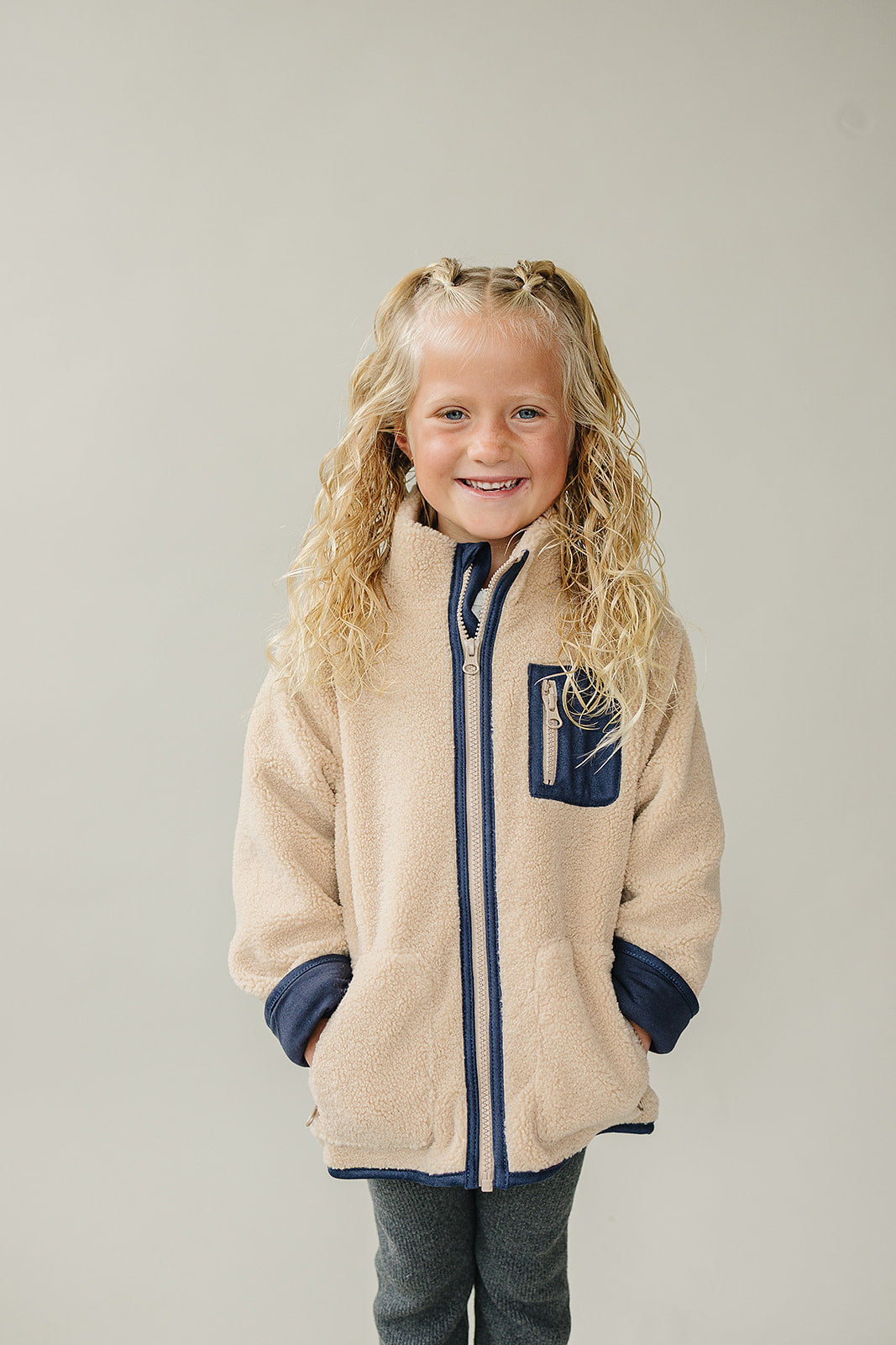 Soft and plush, the Mebie Baby Sherpa Zip-Up Jacket is perfect for newborn baby clothes collections