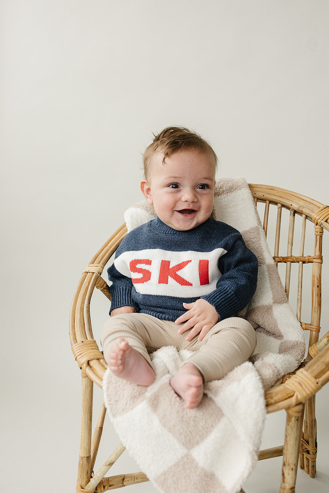 Mebie Baby Ski Sweater photographed for everyday wear, a versatile choice for trendy baby clothes