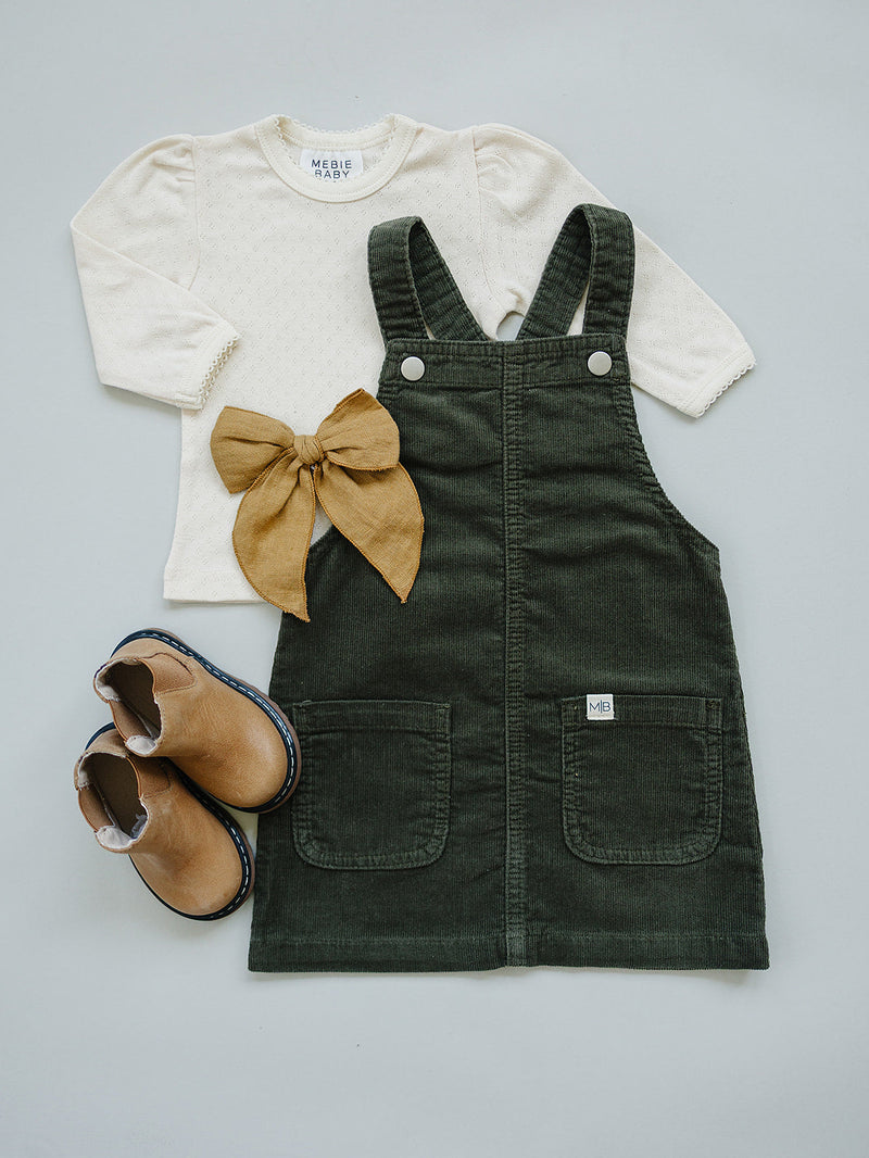Mebie Baby Green Corduroy Dress photographed for seasonal style, ideal for shopping baby clothes online