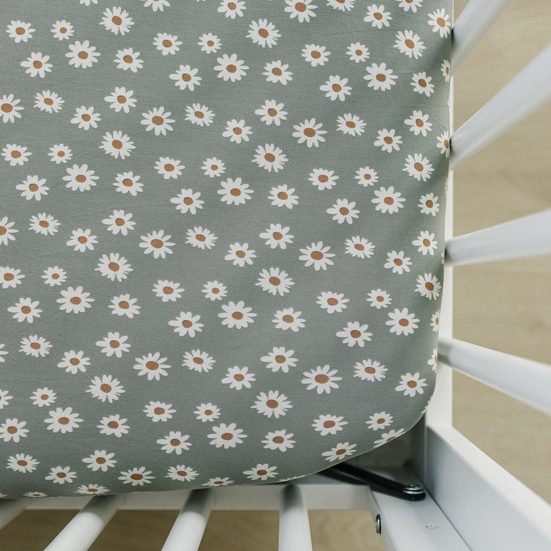 Mebie Baby Light Green Daisy Bamboo Stretch Crib Sheet offers soft and breathable baby crib sheets for a cozy nursery.