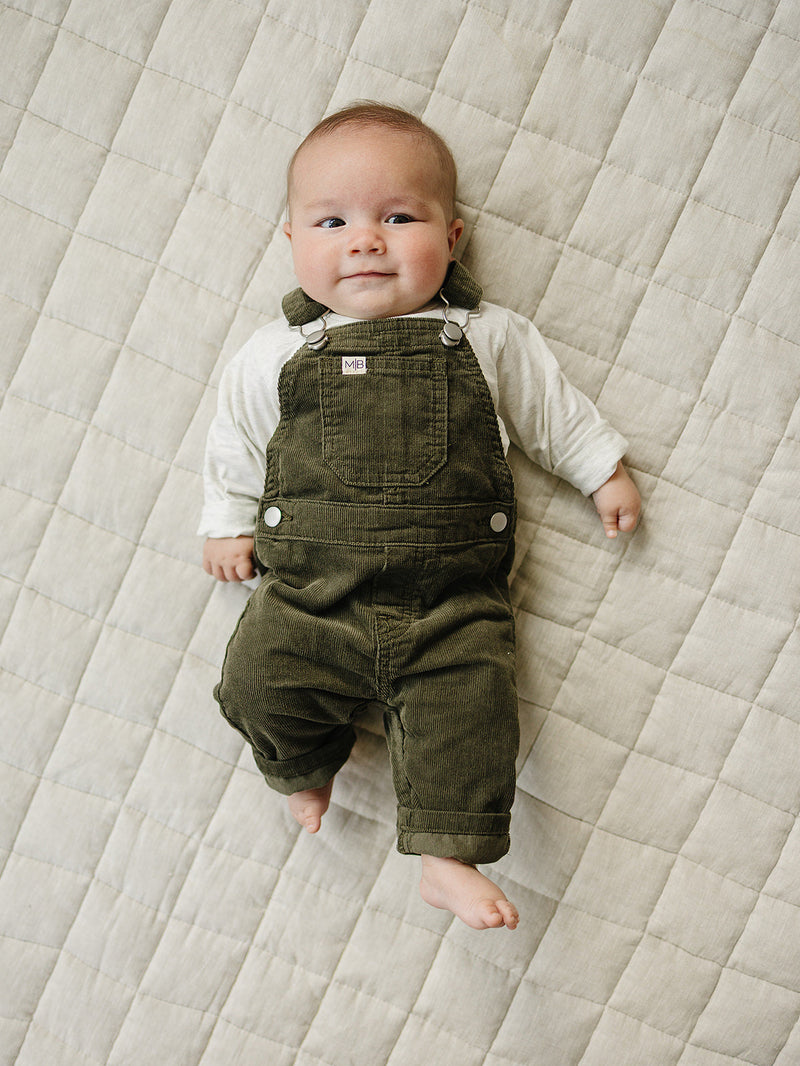 Mebie Baby Green Corduroy Overalls shown in rich texture, perfect for parents shopping organic baby clothes with style