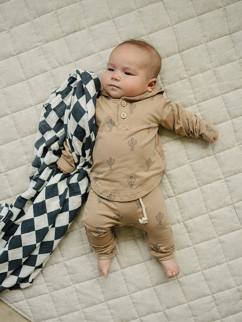 Soft fabric and a cozy hood give the Mebie Baby Cactus Hooded Set appeal as cute baby clothes