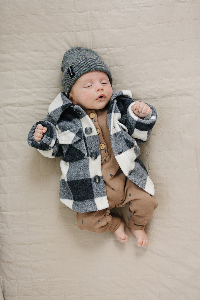 Baby wearing the Mebie Baby checkered sherpa jacket