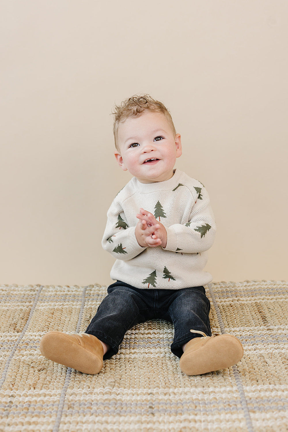 Layer little ones in the soft Mebie Baby Pine Tree Knit Sweater, ideal for newborn baby clothes