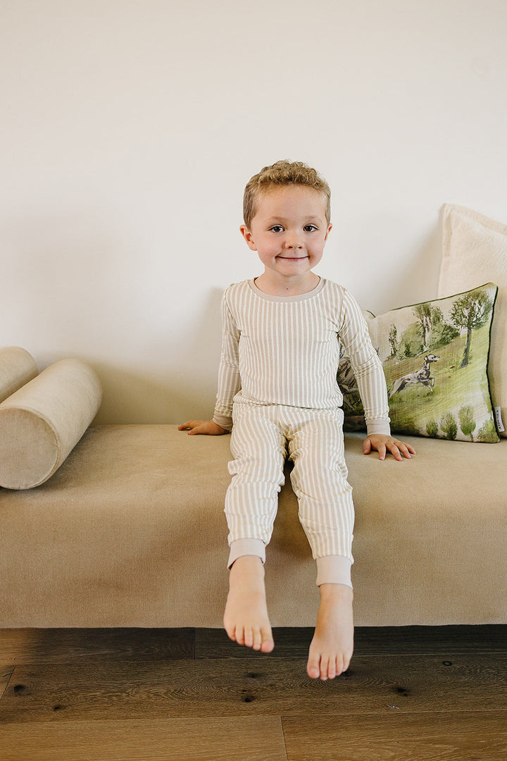 Little ones stay snug in the Mebie Baby Taupe Stripe Ribbed Bamboo Cozy Set, ideal for bamboo baby pajamas