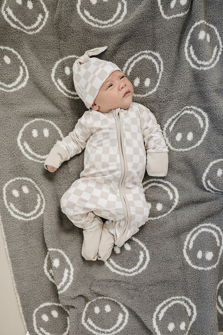 Mebie Baby Taupe Checkered Bamboo Zipper photographed in natural light to show true color
