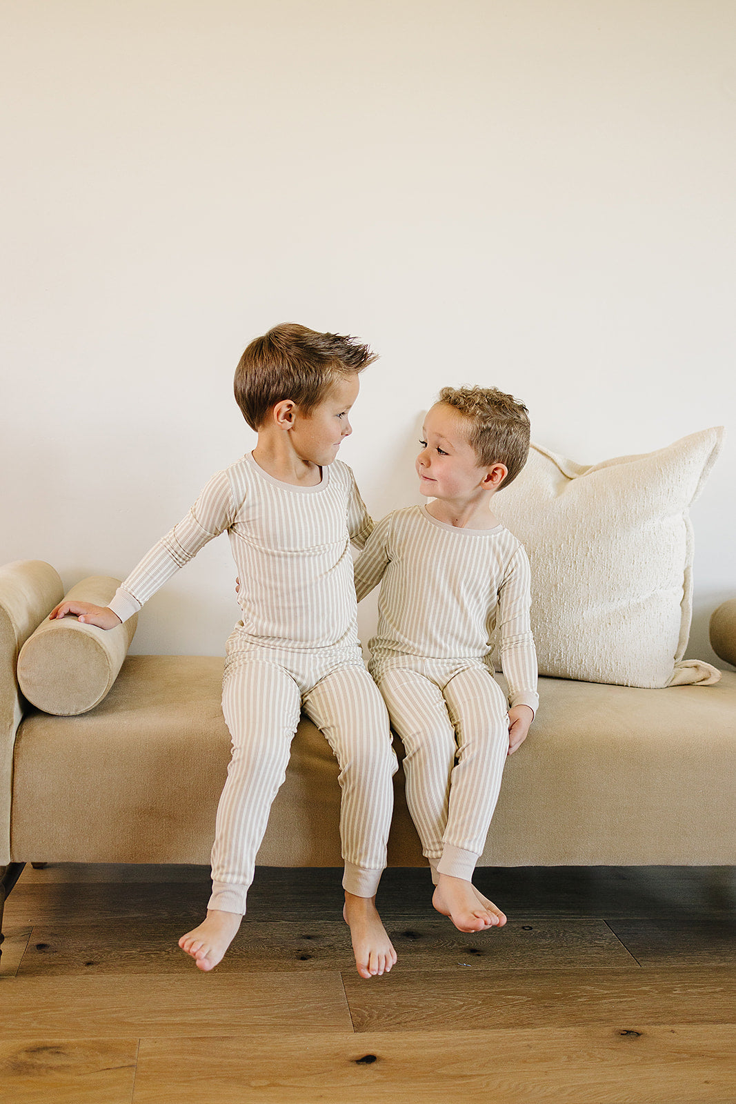 Designed for comfort and style, the Mebie Baby Taupe Stripe Ribbed Bamboo Cozy Set is a top pick in organic baby clothes