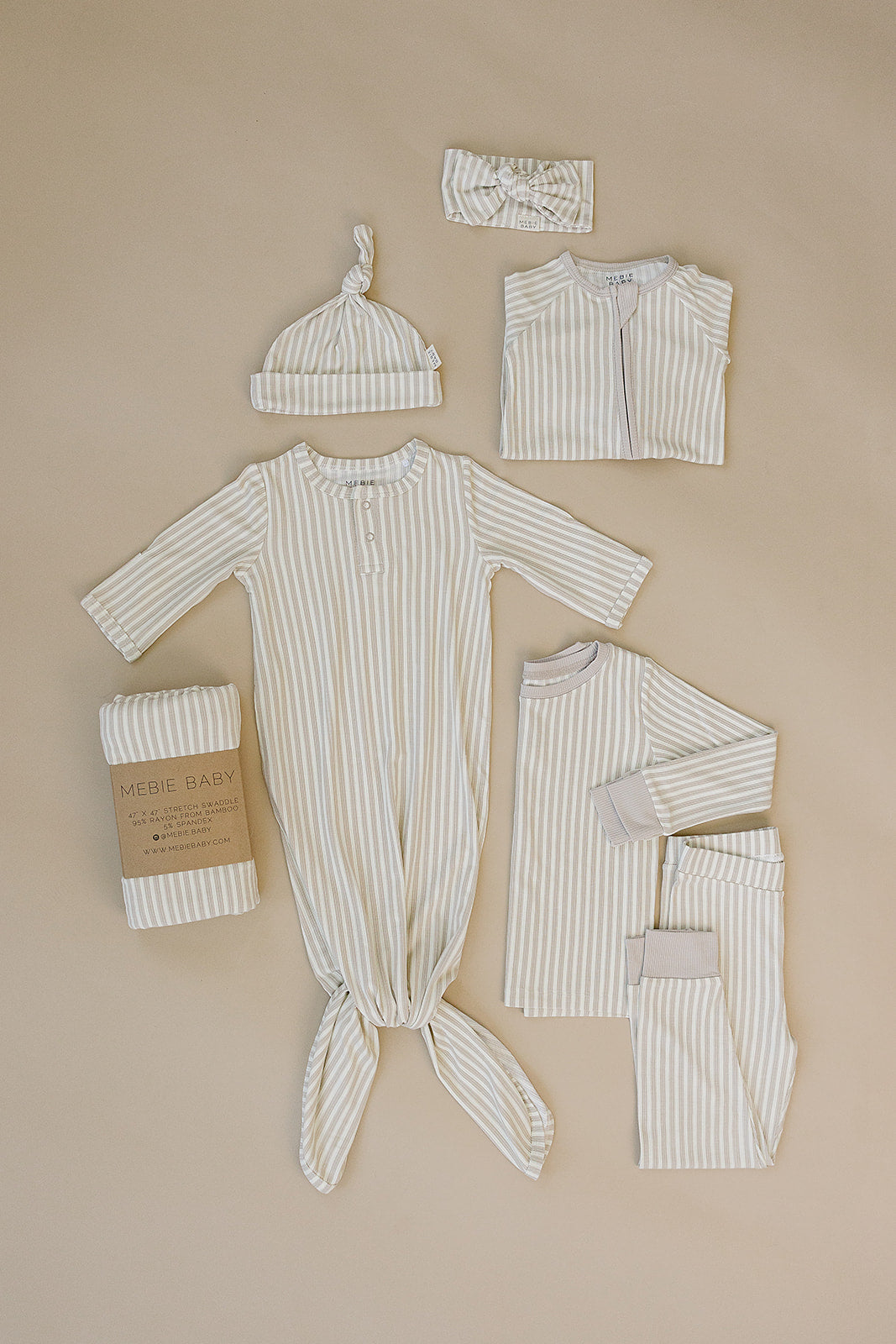Layer little ones in the Mebie Baby Taupe Stripe Ribbed Bamboo Cozy Set, a versatile choice in baby clothing