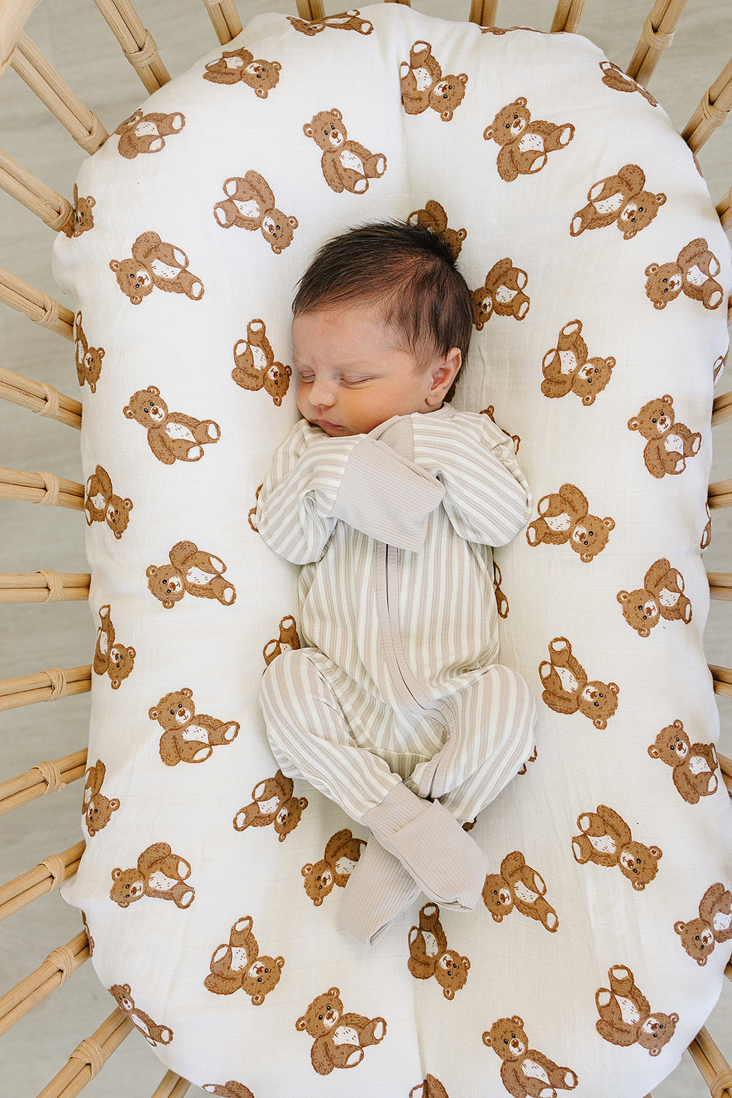 Designed for easy dressing, the Mebie Baby Taupe Stripe Ribbed Bamboo Zipper works perfectly as comfy onesie pajamas