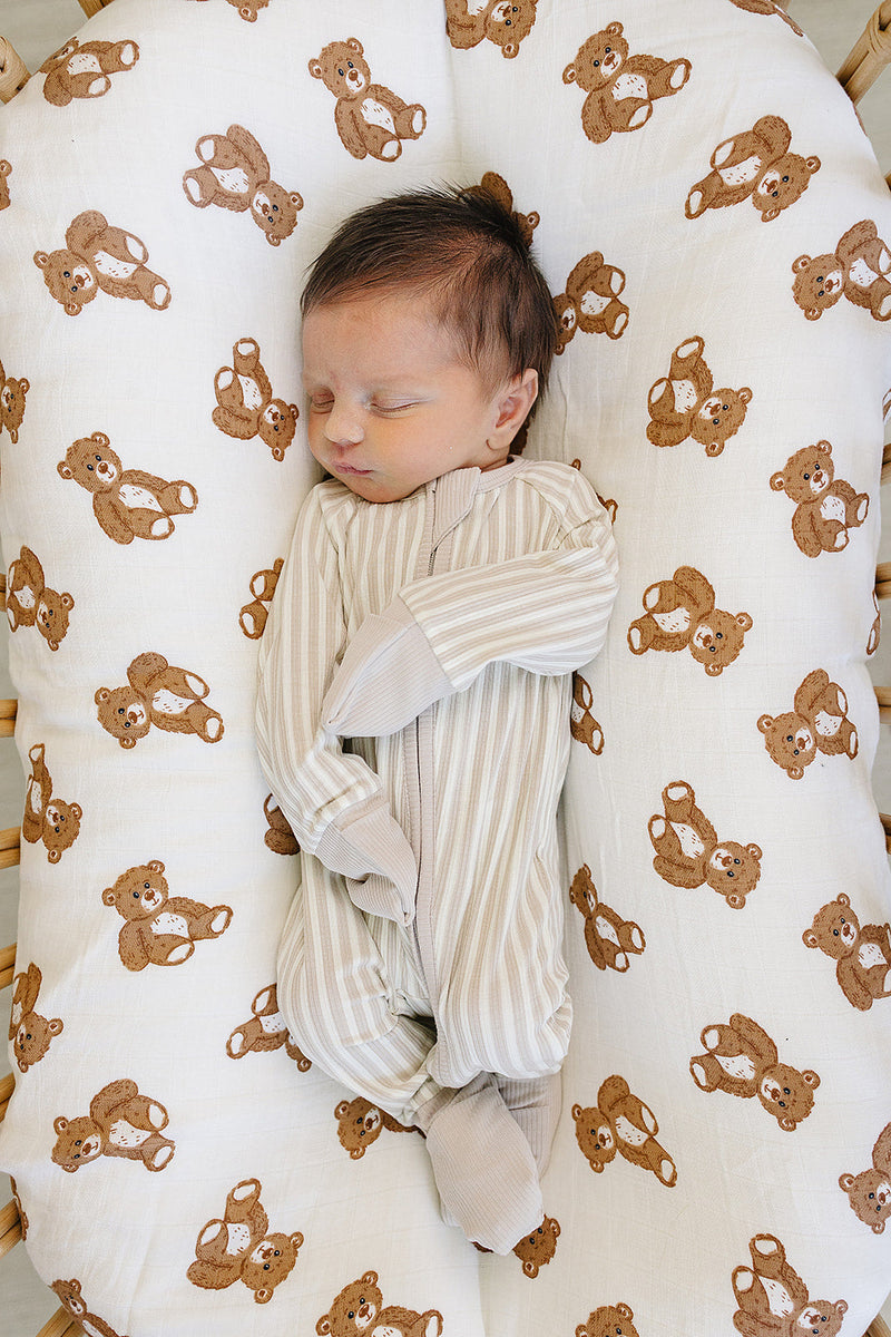 Stretchy and gentle, the Mebie Baby Taupe Stripe Ribbed Bamboo Zipper offers comfort similar to bamboo onesies