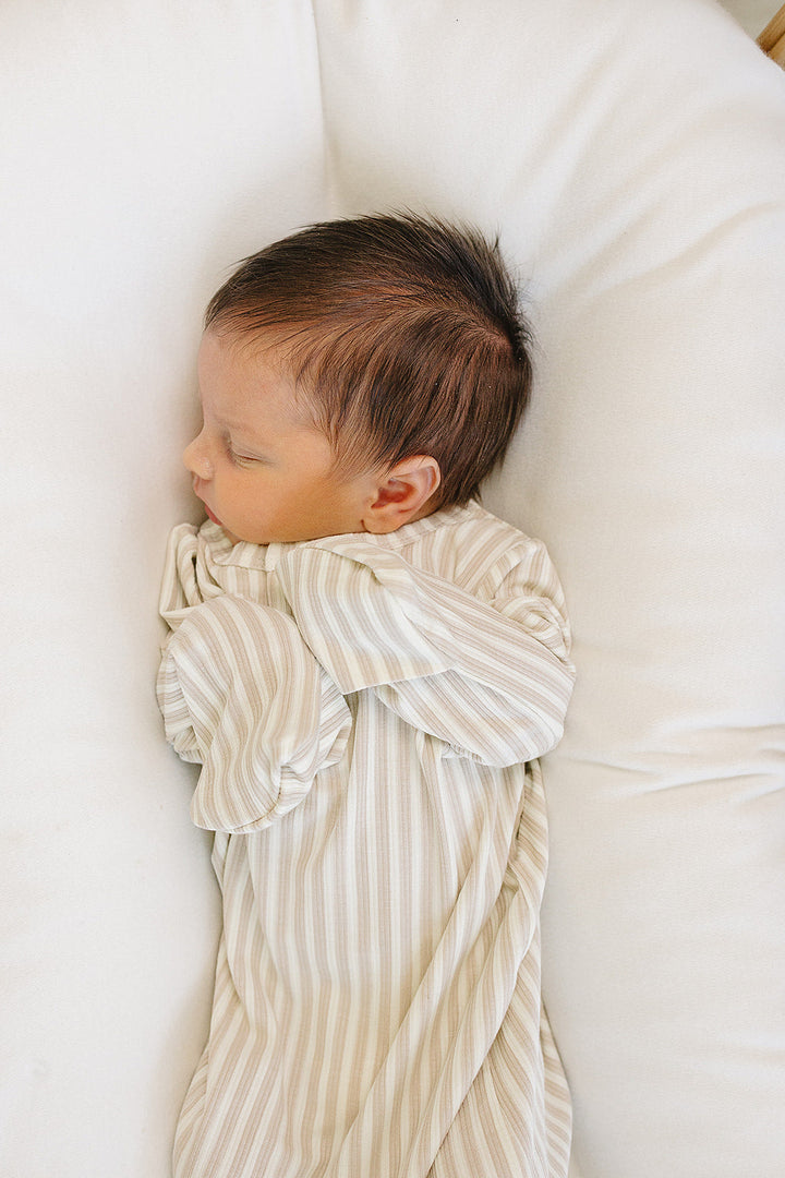 A timeless taupe stripe pattern defines the Mebie Baby Taupe Stripe Ribbed Bamboo Knot Gown, perfect for newborn baby clothes