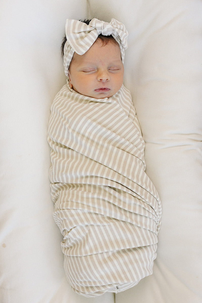 Keep your little one cozy with the Mebie Baby Taupe Stripe Ribbed Bamboo Stretch Swaddle, ideal baby swaddle blankets.
