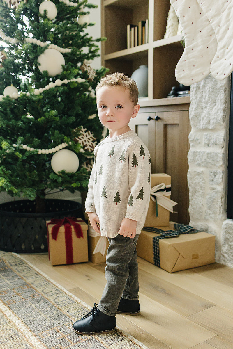 The Mebie Baby Pine Tree Knit Sweater offers warmth and charm, perfect for organic baby clothes collections