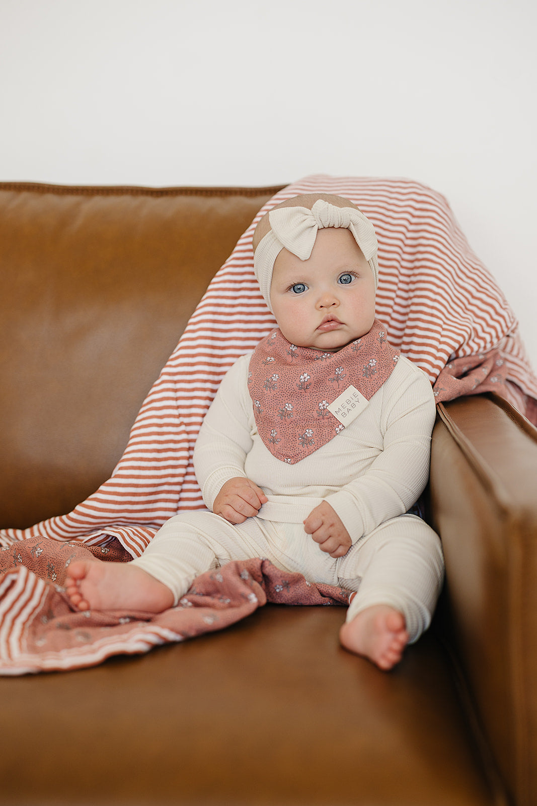 Keep infants cozy with the Mebie Baby Vintage Pink Floral + Pink Stripes Muslin Quilt, ideal muslin blankets.