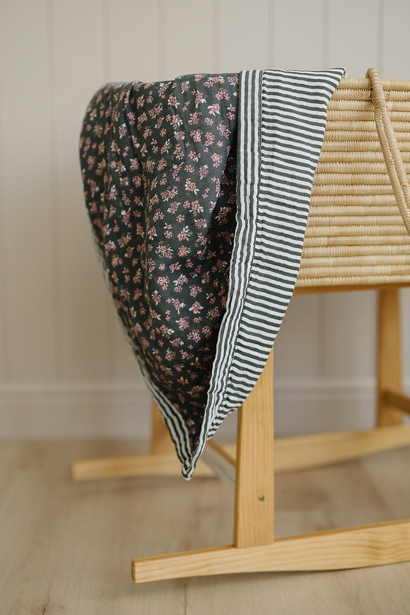 Mebie Baby Olive Bloom + Green Stripes Muslin Quilt offers gentle comfort as a breathable muslin.