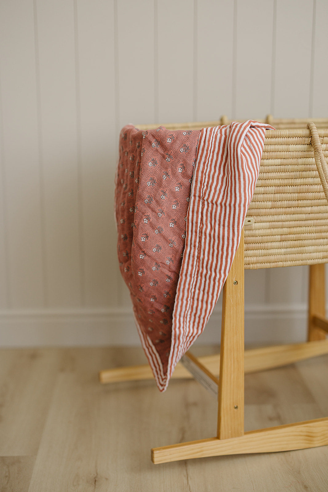 Mebie Baby Vintage Pink Floral + Pink Stripes Muslin Quilt offers gentle comfort as a breathable muslin.