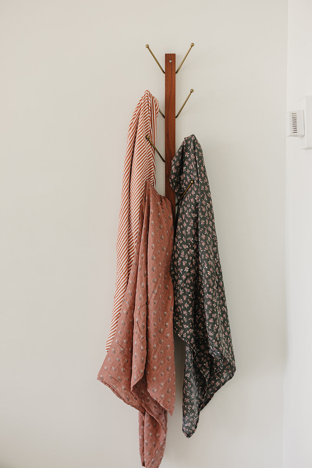 Mebie Baby Olive Bloom Muslin Swaddle Blanket is ideal for snuggles as a comfortable muslin swaddle.