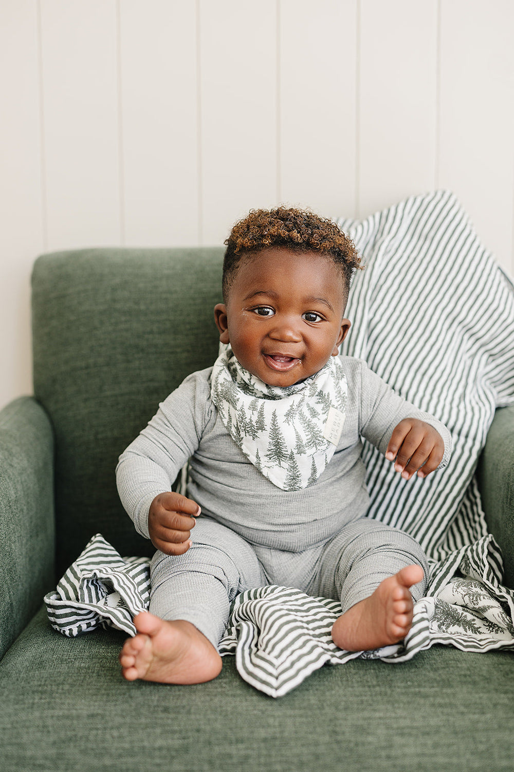 The Forest Classic Muslin Bib by Mebie Baby is gentle and durable, perfect as bibs for babies.