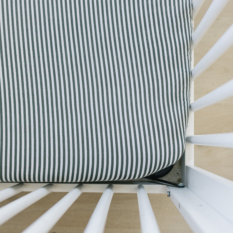 Wrap your babyÕs crib in soft comfort with the Mebie Baby Green Stripes Muslin Crib Sheet, perfect crib sheets.