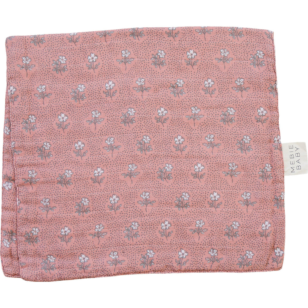 Soft and durable, the Mebie Baby Vintage Pink Floral Muslin Burp Cloth keeps baby clean during feeding.