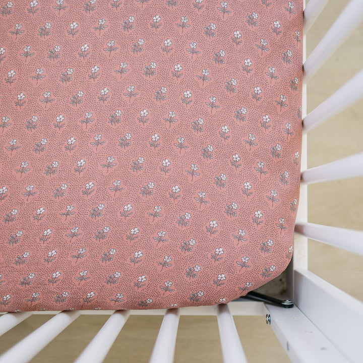 Soft and breathable, the Mebie Baby Vintage Pink Floral Muslin Crib Sheet is perfect crib sheets for baby nurseries.