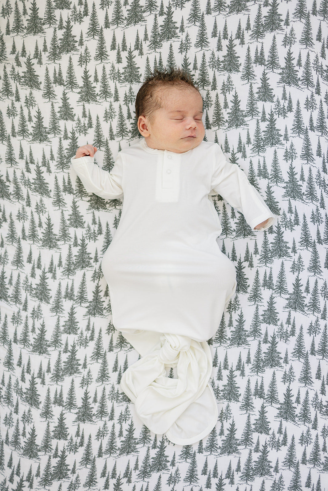 The Mebie Baby Forest Muslin Crib Sheet provides a snug fit, perfect fitted crib sheets for infants.